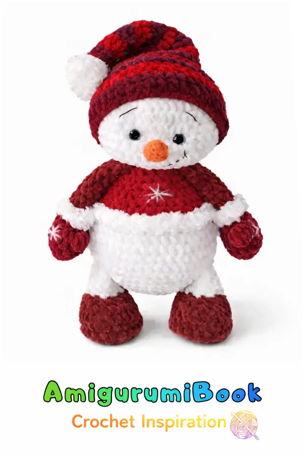 Cute amigurumi snowman crochet toy standing on white surface, soft plush yarn texture